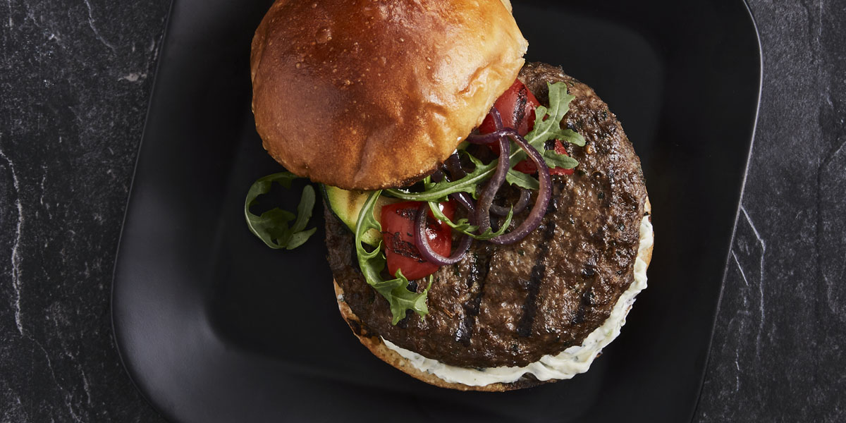 STEAK SPICE BURGER WITH HERB GARLIC CHEESE AND GRILLED VEGETABLES NZ
